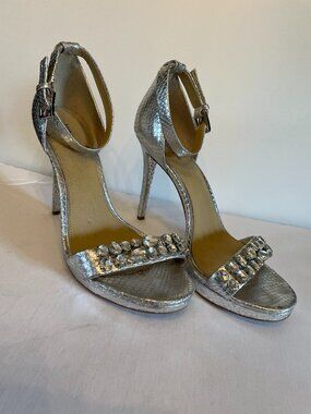 Michael Kors silver snakeskin embossed ankle-strap high heeled sandals, size 9.5